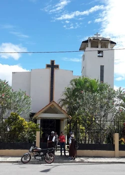 Churchgoers gather outfront