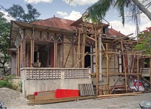 This Gingerbread house on Rue Lamartiniere is being repaired and renovated as a restaurant.