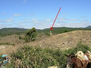 Red arrow pointing to Dominican Republic border post