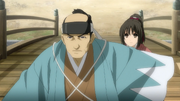 Inoue protects Chizuru from gunshots at Yodo Castle