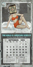 September page of "The girls of Aperture Science" 1983 calendar, with a girl posing in bikini on an elevator or Unstationary Scaffold platform, as seen in one of Ratman's dens.