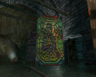 Stained glass of Gordon and his crowbar in the E3 map in "e3_techdemo_5", reused with small changes for Counter-Strike: Source's "Video Stress Test".