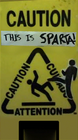 Unused wet floor sign texture, humorously referencing the film 300, and the infamous meme "This is Sparta!". While no model exists, the texture file is located in the folder "props_facemovie". It is based on a picture originally posted on the Escapist forums.