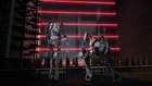 ATLAS and P-body facing crushers and lasers in the Portal 2 co-op trailer.