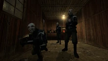 Varios Metrocops preparados para emboscar a Gordon y a la Resistencia durante  en HL2.