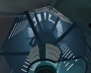 Vista del generador de GLaDOS, junto con sus discos, y más arriba