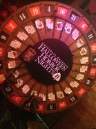 Lady Luck's roulette wheel from the Your Luck Has Run Out scarezone during Halloween Horror Nights 21 Image from HorrorUnearthed