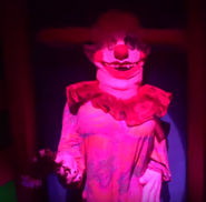 Daisy the Clown Girl in the Killer Klowns From Outer Space haunted house in Orlando. Image from The DIS on Youtube.