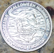 The front of one of the coins that they threw out of the parade floats.