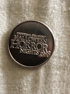 HHN 28 Arcade Coin [Back] [From HorrorUnearthed]