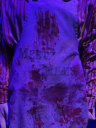 Meetz Meats used costume (Close Up) from this house featured in the Unmasking The Horror Tour Waiting Room Image from HorrorUnearthed