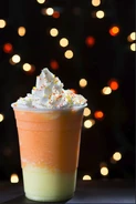 Candy Corn Drink - bottom layer is toasted marshmallow; middle is candy corn flavor, top is whipped cream with sprinkles - available at New York area at the Gramercy Popcorn stand and stand near the front entrance of Universal Studios