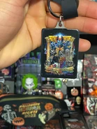 D6F2236F-B0B0-4BCC-AA97-3357C23A82D2.jpeg (1.77 MB) Halloween Horror Nights 2022 Artist Series Universal Monsters: Legend Collide Keychain Image from HorrorUnearthed