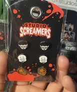BDAC2386-6D56-4C5B-A2D7-EBECE5A323D5.jpeg (1.4 MB) Halloween Horror Nights 2022 tudio Screamers Earrings Image from HorrorUnearthed