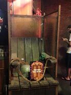 Port of Evil prop chair from Halloween Horror Nights 14 Image from HorrorUnearthed