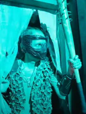 The Gasmasked-Wearing Filly Resident as they appeared in Fallout (Orlando). Image from Undercover Tourist on Youtube.