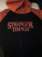 HHN 28 Stranger Things Red & Black Hoodie [Front] [From HorrorUnearthed]