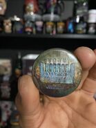 Halloween Horror Nights 22 HorrorUnearthed Button [Image from EvilTakesRoot]