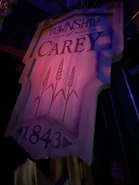 Township of Carey 1843 Sign from Twisted Traditions featured at Halloween Horror Nights 28. Image from HorrorUnearthed