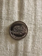 HHN 28 Arcade Coin [Front] [From HorrorUnearthed]