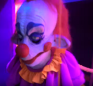 Rudy the Clown in the Killer Klowns From Outer Space haunted house in Orlando. Image from The DIS on Youtube.