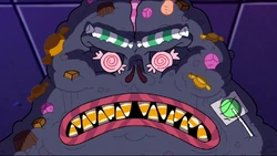 The Trickster reveals that he is made of "loser candy" that kids threw away.