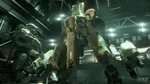John-117, stands before a Mantis, held in the Vehicle Bay on UNSC Infinity.