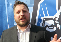 Jeff Easterling in front of an  banner.
