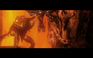 A screenshot of one image shown in the trailer following the campaign level shown at E3 2012. It shows a promethean knight throwing an Elite to the ground.