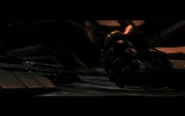 A screenshot of one image shown in the trailer following the campaign level shown at E3 2012. It shows S-117's gloved fist on the ground.