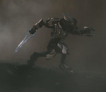 A Sangheili Ultra firing its Plasma Rifle while wielding an Energy Sword in its right hand as seen in Deliver Hope trailer.