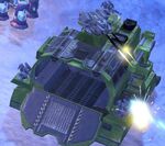 A Halo Wars Elephant taking fire, and returning it with its three machine guns and a roof-mounted autocannon.