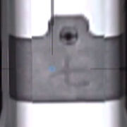 七, the Chinese and Japanese character for 7, is visible on the 's ejection port.