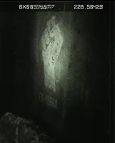 Ex-Terra fist.png (146 КБ) Эмблема в виде кулака "Экс-Терра" на стене укреплений повстанцев, 2526 год.