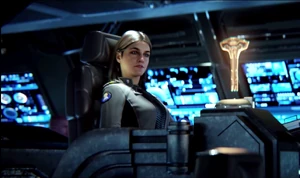 Миранда Киз смотрит на голограмму Индекса