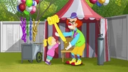The Angry Clown, giving a balloon hammer to a child.