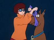 Velma Tying Scooby's Mouth