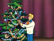 Fred decorating a tree