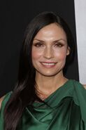 Famke smiles.