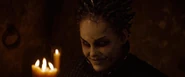 The Horned Witch smiles.