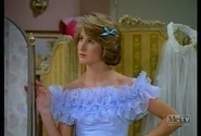 Jenny wearing a bridesmaid dress