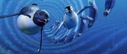 Gloria and Mumble swim through a spiral of bubbles as they explore the ocean for the first time in Happy Feet