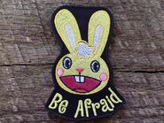 A third Cuddles patch, with the message "Be Afraid."