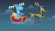 The Reindeer pulling Lumpy on a sleigh.