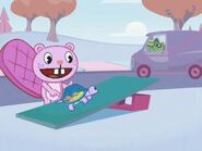 Toothy waiting for his tortoise to fly off the ramp.