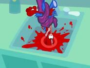 Petunia's body completely mangled up after the Demon puls her through the drain.