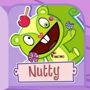 Nutty: Waves while holding a lollipop with his left hand and leaning to his right.