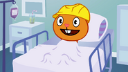 Handy happily wakes up in the hospital.