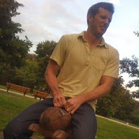 Jim on a carved beaver statue.