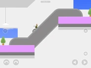 Going up the first escalator.